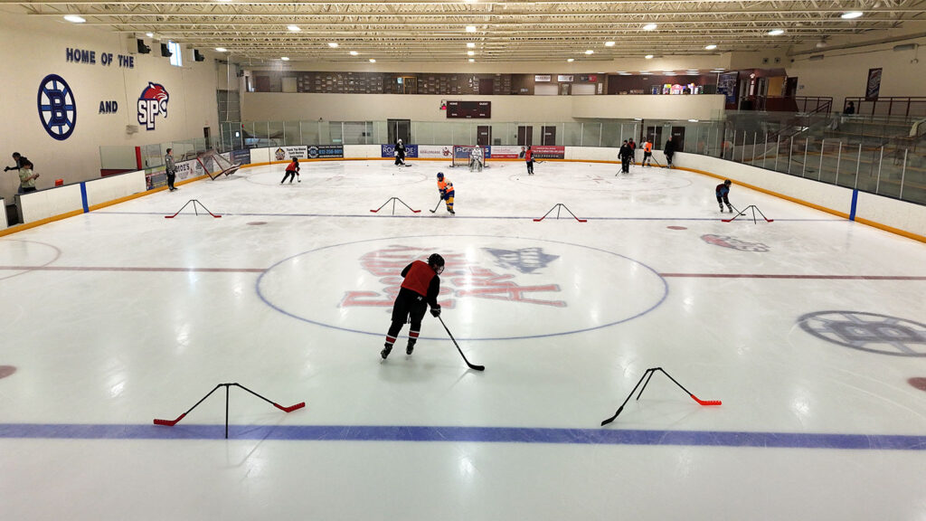 Player skating at Fogerty Arena during an on-ice session
